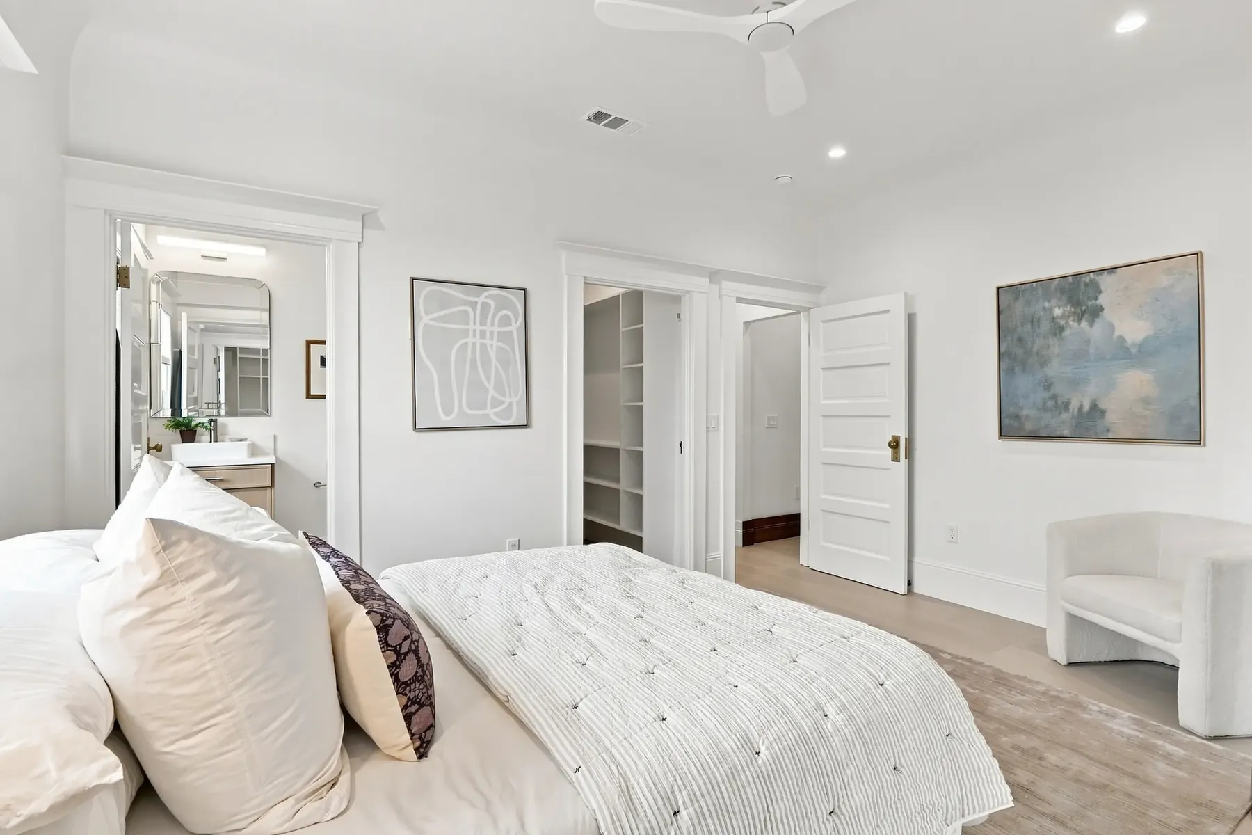 Bedroom with a direct line into its bath and closet.